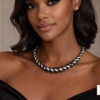 Carbon Axis Kumihimo necklace worn by model, featuring black, white, and gray spiral braid with subtle black bead detailing